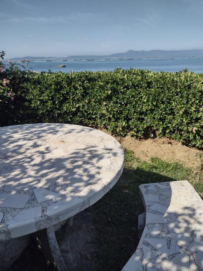 Casa Con Jardin En Primera Linea De Playa O Grove Bagian luar foto